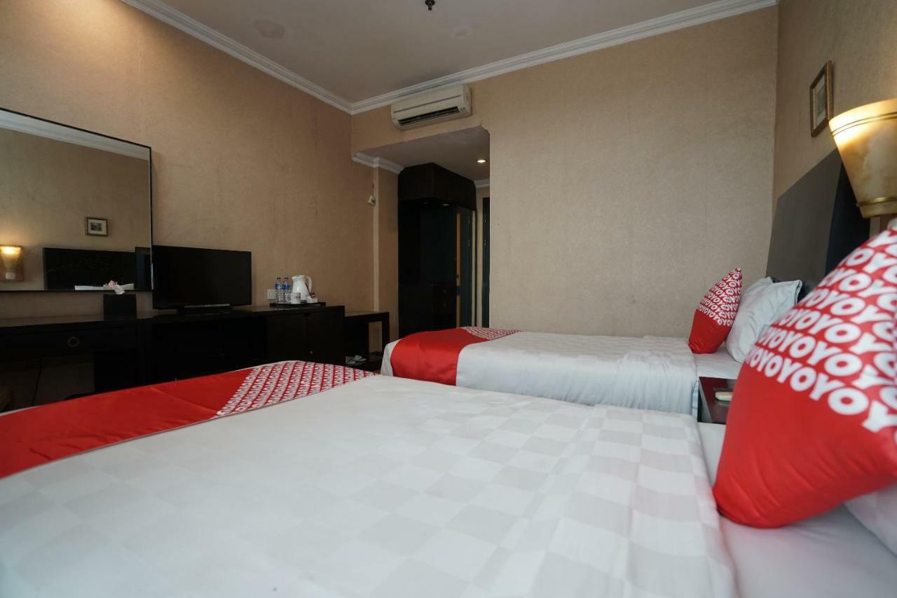 Capital O 1128 Hotel Imara Palembang Exterior foto