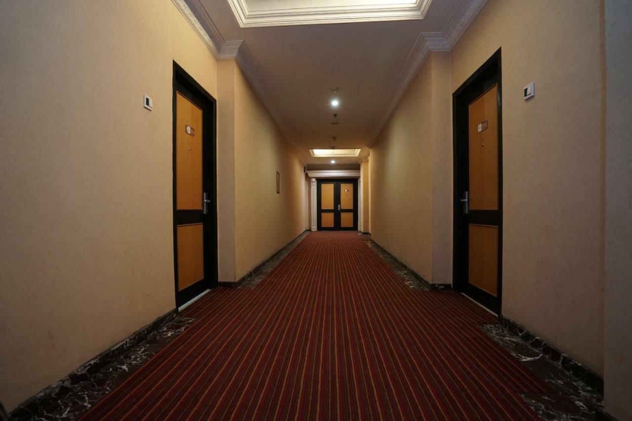 Capital O 1128 Hotel Imara Palembang Exterior foto